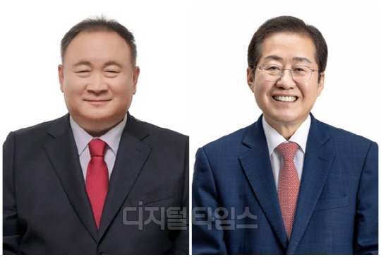 이상민(왼쪽) 국민의힘 의원과 홍준표 대구시장. <디지털타임스 DB>